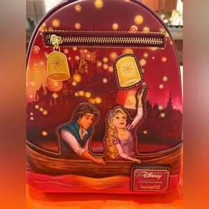 Loungefly Disney Maroon and Gold Backpack with Lantern Scene Tangled